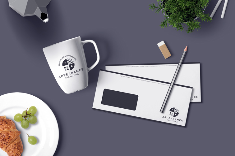 Horizontal Brochures with Pencil and Cup on a Desk