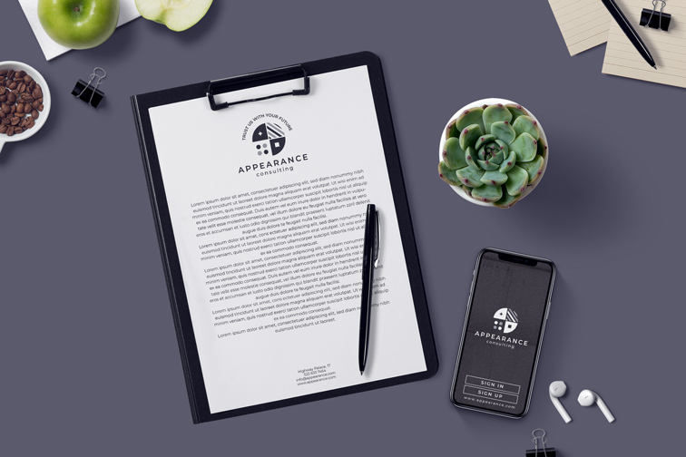 Clipboard, Pen, and Phone on a Desk