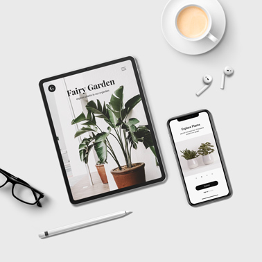 iPhone and iPad Pro on a White Desk