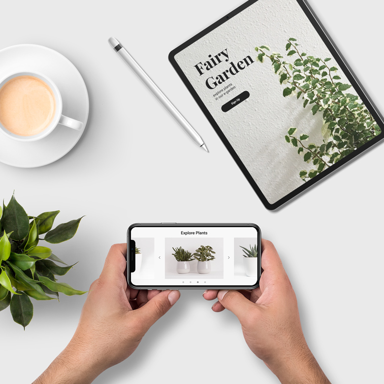 Hands Holding iPhone near iPad Pro and iPencil