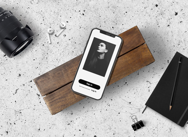 iPhone and AirPods on a Photographer Desk