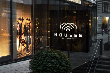 Outdoor Store Sign at Night