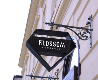 Diamond-Shaped Wrought Iron Signage