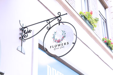 Round Wrought Iron Store Sign