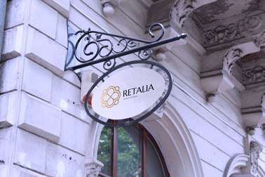 Oval Wrought Iron Store Sign