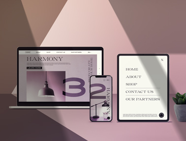 MacBook, iPad, and an iPhone in Shade