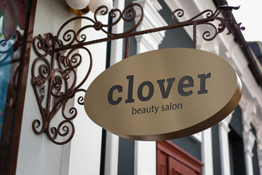 Oval Wrought Iron Store Sign