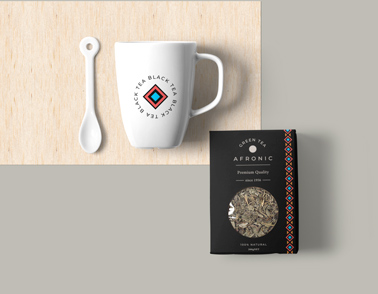 Paper Tea Package, a Cup, and a Tablespoon
