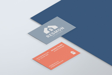 Business Cards and a Piece of Blue Paper