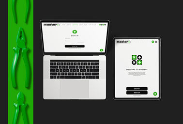 MacBook y iPad Pro junto a herramientas de reparación