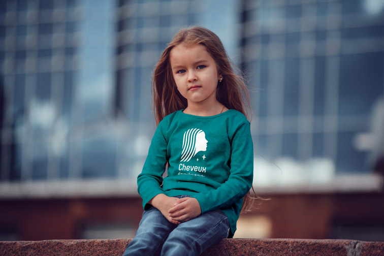 Little Girl Sitting on Stairs