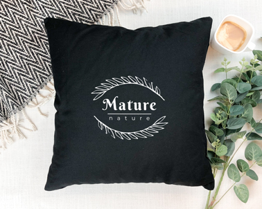 Cushion with a Cup of Coffee on a Blanket