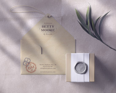 Hanging Envelope, a Wrapped Box, and a Plant