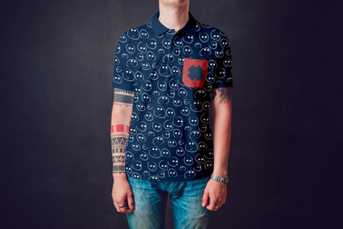 Tattooed Man Wearing a Polo Shirt