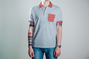 Tattooed Man with a Casual Polo Shirt