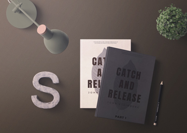 Two Hardback Books on a Writing Desk