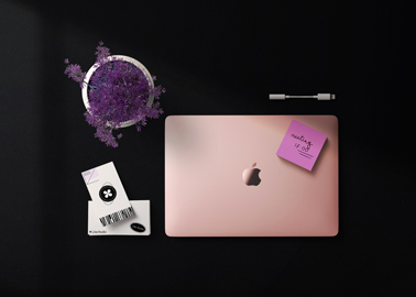 Closed Laptop with Office Supplies