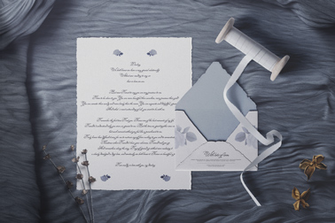 Love Letter, an Envelope, and a Ribbon Roll