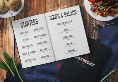 Hardcover Menus on a Dining Table