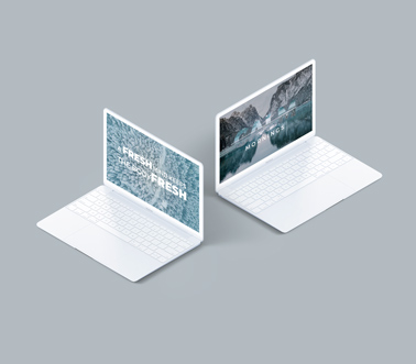 Два белых ноутбука MacBook на сером фоне