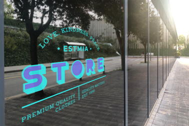 Logo Signage on a Floor to Ceiling Window