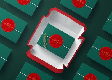 Open Gift Box in the Middle of Wrapped Boxes