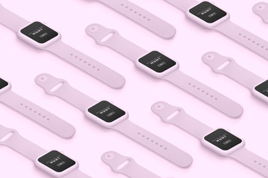 Apple Watches isométriques sur une surface rose