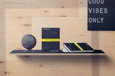 Books and a Globe on a Wall-Mounted Desk