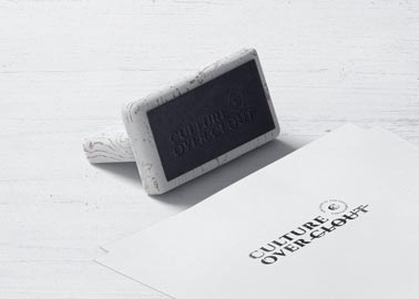 Wooden Stamp and a Flyer From Left Side