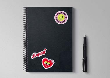 Three Stickers on a Spiral Sketchbook