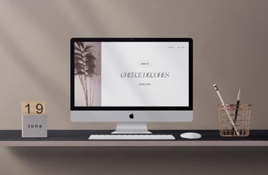 Modern iMac Desktop with Stationery