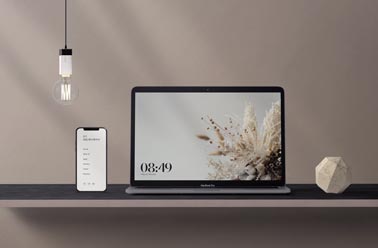 iPhone and a MacBook on a Modern Desk