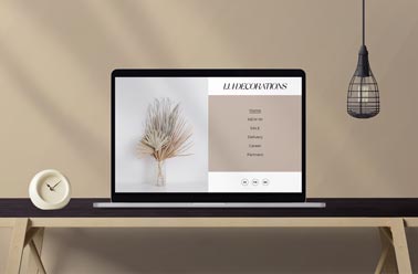 MacBook and a Clock on a Modern Desk