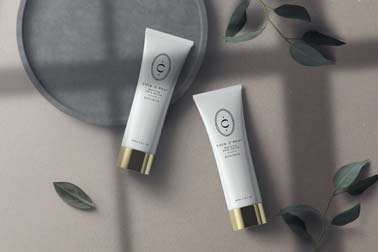 Two Cosmetic Tubes on an Elegant Background