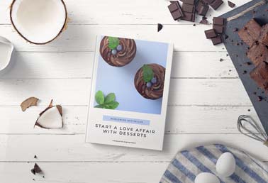 Cookbook next to Coconut and Chocolate