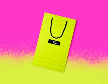 Vertical Paper Bag on a Neon Pink Background