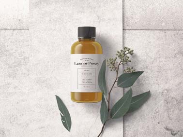 Cosmetic Bottle with a Plant Branch