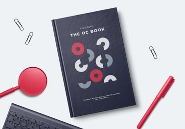 Book and Stationery on a White Surface