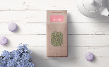 Organic Tea Package on a Wooden Background