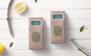 Two Tea Packages on a Wooden Background