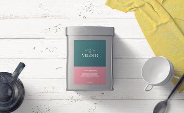 Metal Tea Container on a Wooden Background