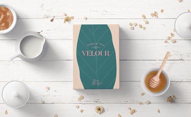 Tea Packaging Box on a Wooden Background