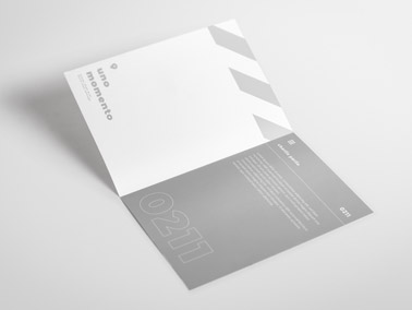 Open Booklet on a White Surface