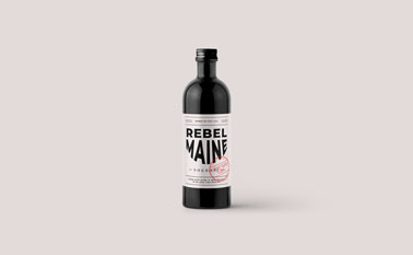 Bottle on a Beige Surface