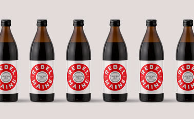 Multiple Glass Bottles on a Beige Surface