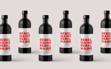 Isometric Bottles on a Beige Surface