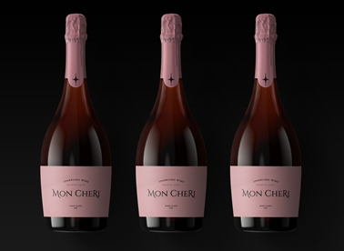 Three Champagne Bottles on a Black Surface