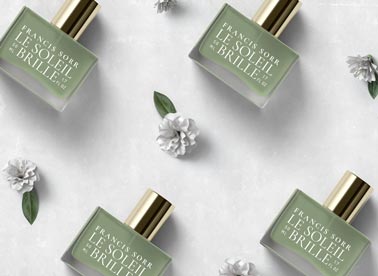 Four Perfume Bottles with Flowers