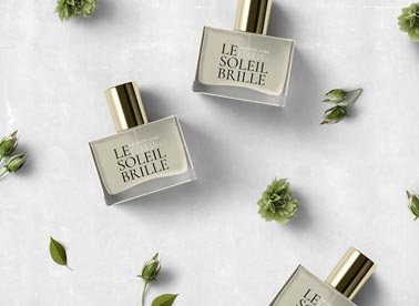 Three Perfume Bottles with Flowers