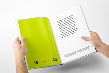 Hand Holding an Open Hardcover Book